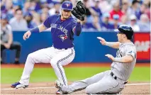  ?? FRANK GUNN/THE CANADIAN PRESS ?? MLB Network’s Jon Heyman reports five teams have shown interest in third baseman Josh Donaldson, although the Blue Jays don’t seem to be interested in trading him right now.