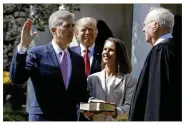  ?? EVAN VUCCI / AP ?? Justice Anthony Kennedy swears in Neil Gorsuch at the White House on Monday. President Donald Trump and Gorsuch’s wife, Marie Louise, look on.