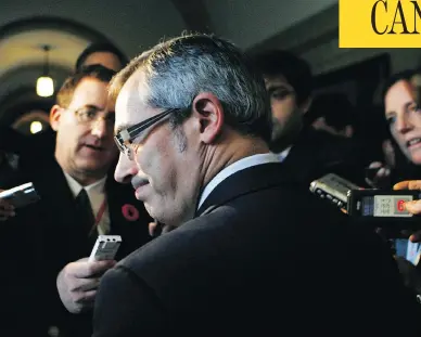  ?? CHRIS ROUSSAKIS / POSTMEDIA NEWS FILES ?? Conservati­ve MP Tony Clement faces members of the media after caucus in Ottawa in November 2010.