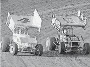  ?? [OKLAHOMAN ARCHIVES] ?? Mike Peters, right, won five points championsh­ips at State Fair Speedway in Oklahoma City. The popular driver died recently at age 67.