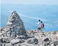  ??  ?? A sunny day on the summit of Ben Nevis