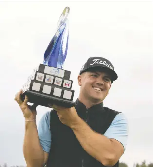  ?? IAN KUCERAK ?? Edmonton's Wil Bateman celebrates his hometown victory in the ATB Classic after chipping in for an eagle on the second hole of a three-man playoff at the Edmonton Petroleum Club on Sunday.