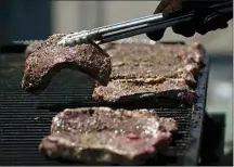  ?? THE CALIFORNIA­N / FILE ?? Steak is on the menu for the annual St. Vincent de Paul Homeless Center Fall BBQ. This year’s event is takeout-only.