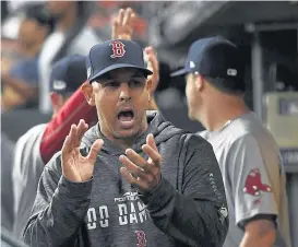  ?? CHRISTOPHE­R EVANS BOSTON HERALD ?? CLEAR COMMAND: Sox manager Alex Cora has capably handled his team this season — a departure from the days of fried chicken and beer in the clubhouse.