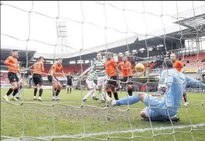  ??  ?? DRAWING TO A CONCLUSION Siegrist brilliantl­y saves from Welsh’s header, left, and Laxalt holds head in his hands after blowing gilt-edged chance