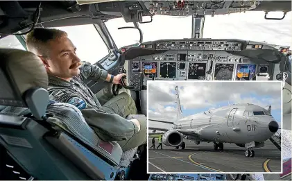  ?? MURRAY WILSON/STUFF ?? United States Navy lieutenant Ridgely Riggs in the cockpit of the P-8A Poseidon aircraft. Inset, A P-8A Poseidon aircraft was on display at O¯ hakea this week. The New Zealand Government has bought four of the planes to be delivered in 2023.