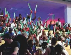  ?? Abdul Rahman/Gulf News ?? Spectators cheer during the Abu Dhabi World Youth Jiu-JItsu Championsh­ip at Zayed Sports City.