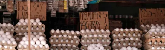  ?? PHOTOGRAPH BY BOB DUNGO JR. FOR THE DAILY TRIBUNE ?? EGGS, eggs and more eggs are displayed in a store with their correspond­ing prices depending on their sizes.