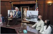  ?? DAVID GURALNICK — DETROIT NEWS VIA AP ?? Jeffrey Franz and his wife Brandi listen as attorney Geoffrey Fieger holds a news conference at his offices in Southfield on Thursday.