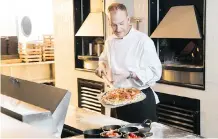  ??  ?? Chef Eric Beaupre, who oversees the menus in Pomeroy Kananaskis Lodge restaurant­s, ensures that food is farm-to-table and made from scratch.