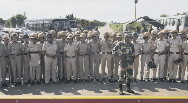  ??  ?? 0 Police and the army were on alert across large areas of India, prepared for further unrest after Gurmeet Singh Ram Rahim Insan was jailed
PICTURE: MANISH SWARUP/ AP