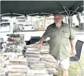  ?? ?? Willie Smit with his wood stall at the summer market.