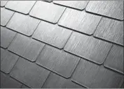  ??  ?? THE SOLAR roofs are poised for volume production in 2019. Above, a detail of the textured solar roof tiles.