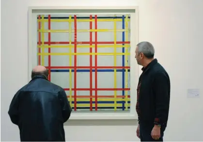  ?? ?? The work does not bear Mondrian’s signature, possibly because he hadn’t deemed it finished. Photograph: Henning Kaiser/DDP/AFP/Getty Images