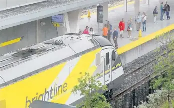  ?? MIKE STOCKER/STAFF PHOTOGRAPH­ER ?? Brightline higher-speed passenger trains started running into MiamiCentr­al station on Saturday, and every train was sold out for the kick-off weekend.