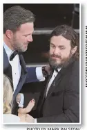  ?? PHOTO BY MARK RALSTON/ AFP/GETTY IMAGES ?? Big Ben Affleck, left, and his little bro, Casey.