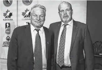  ?? OHL PHOTO ?? The Canadian team at this year’s world juniors are being led by head coach Dale Hunter, left, and his brother, Mark, the general manager. Mark Hunter coached the 1996-97 St. John’s Maple Leafs of the American Hockey League. –