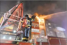  ?? Alex von Kleydorff / Hearst Connecticu­t Media ?? Norwalk firefighte­rs respond to 100 Richards Ave., at a condo complex in 2017.