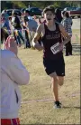  ?? Graham Thomas/Herald-Leader ?? Siloam Springs freshman Corbett Stephenson crosses the finish line to place first overall in the junior high boys division of the 5A-West Conference Championsh­ips on Thursday, Oct. 27, in Siloam Springs.