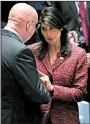  ?? AP/JULIE JACOBSON ?? Nikki Haley, U.S. ambassador to the United Nations, confers Tuesday with Russian counterpar­t Vassily Nebenzia before their competing resolution­s on Syria failed in U.N. Security Council votes.