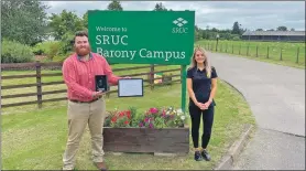  ??  ?? Wallace Currie, award winner, and Amy Lenathen NFU Mutual sales developmen­t manager.