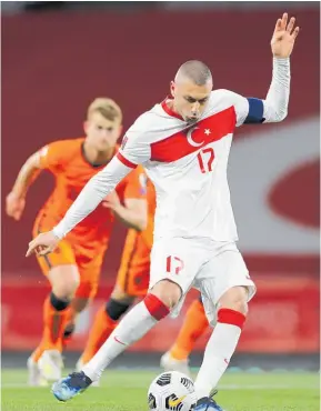  ?? Photo / AP ?? Turkey’s hat-trick hero Burak Yilmaz scores against the Netherland­s at Ataturk Olympic Stadium.