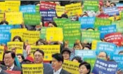  ?? AP ?? Members of the Korea Freedom Federation shout slogans during a rally in Seoul to denounce North Korea's nuclear test.