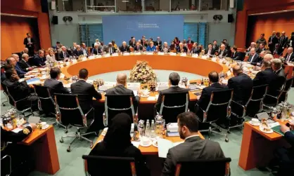  ?? Photograph: Pool/Reuters ?? ‘The UN says that several participan­ts in the Berlin meeting have since shipped both arms and mercenarie­s to Libya, blatantly violating the embargo.’