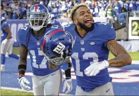  ?? AP FILE ?? Odell Beckham Jr. (13) is the subject of trade speculatio­n after some verbal sparring with Giants management. Team executives stopped short of ruling out a deal.