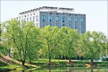  ??  ?? The LEED Platinum-certified Proximity Hotel, in Greensboro, North Carolina, is topped with 100 solar panels.