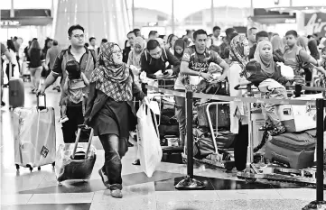  ?? — Bernama photo ?? Millions of airline passengers in Malaysia can look forward to better services once the Airports Quality of Service framework is rolled out by airports in Malaysia in stages later this year, says MAVCOM.