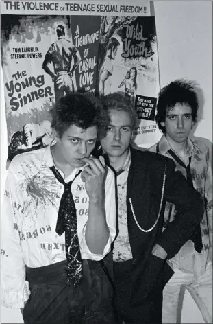  ?? SHEILA ROCK ?? “The Clash, Young Sinner” taken by Sheila Rock in 1976. From left, bassist Paul Simonon, vocalist and guitarist Joe Strummer and vocalist and guitarist Mick Jones.