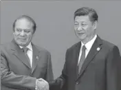  ??  ?? Chinese President Xi Jinping (R) with Pakistan Prime Minister Nawaz Sharif during the Belt and Road Forum, last week in Beijing. GETTY IMAGES