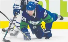  ?? BOB FRID/USA TODAY SPORTS ?? Canucks winger Antoine Roussel has always played with an edge, but admits he needs to take fewer penalties.