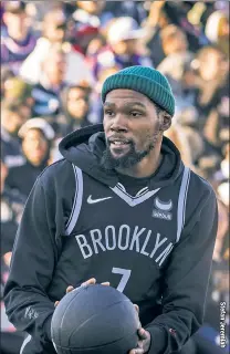  ?? ?? PLAYING IN THE PARK: Kevin Durant prepares to take a shot during the sixth annual Practice in the Park held at Brooklyn Bridge Park’s Pier 2 in Brooklyn Heights.