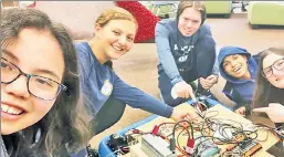  ?? ?? QUICK SUCCESS: Sonia Benowitz (second from left) founded the robotics club with three fellow WESS ninth-graders in September.