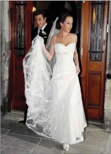  ?? Canadian Press file photo ?? Ben Mulroney and his bride Jessica Brownstein leave St. Patrick’s Basilica in Montreal after their wedding ceremony on Oct. 30, 2008. All three of Ben and Jessica Mulroney’s children have been selected to be among the bridesmaid­s and page boys for...