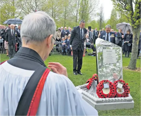  ?? ?? Wreaths were laid at a new memorial during a service to mark the 40th anniversar­y of the sinking of HMS Sheffield at the National Memorial Arboretum in Staffs