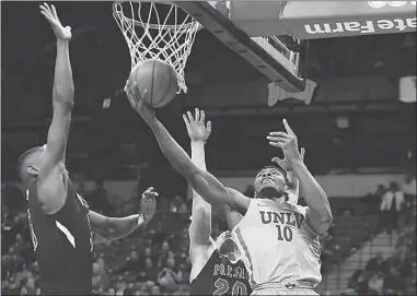  ?? STEVE MARCUS ?? UNLV Rebels forwardSha­kur Juiston (10) scores Feb. 21 against the Fresno State Bulldogs at the Thomas &amp; Mack Center. Juiston averaged 14.6 points per game with 63.9 percent shooting last season and could emerge as the Rebels’ go-to scorer in 2018-’19.