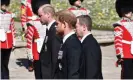  ?? Photograph: WPA/Getty Images ?? The Duke of Cambridge, Peter Phillips and the Duke of Sussex walk behind the Land Rover hearse.