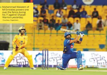  ?? Courtesy: Organisers ?? Muhammad Waseem of MI Emirates powers one over the fence during his 71 against Sharjah Warriors yesterday.