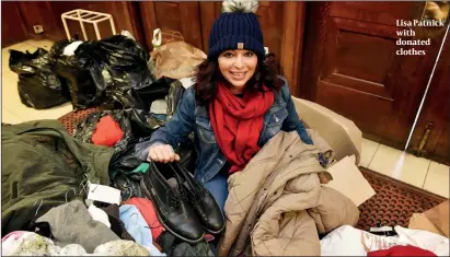  ??  ?? Lisa Patnick with donated clothes