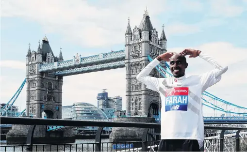  ?? PHOTO: REUTERS ?? I’m back . . . Mo Farah does his trademark ‘‘Mobot’’ in front of Tower Bridge in London yesterday.