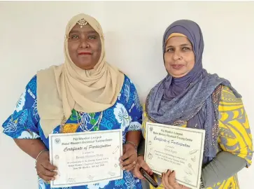  ?? Photo: Shreeya Verma ?? From left: Rainaz Nisha and Dilshad Begum with their certificat­es after graduating with Culinary Certificat­es from the Fiji Muslim League Makoi Women’s Vocational Training Centre on July 30, 2020.