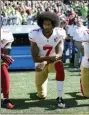  ?? TED S. WARREN — THE ASSOCIATED PRESS FILE ?? In this file photo, San Francisco 49ers’ Colin Kaepernick kneels during the national anthem before an NFL football game against the Seattle Seahawks in Seattle. The same guys who banished Kaepernick from the league for kneeling during the anthem to raise awareness about those very same issues have ruthlessly commandeer­ed his cause.