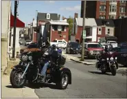  ??  ?? Luis Gonzalez of the Berks County chapter of the Blue Knights Law Enforcemen­t Motorcycle Club leads the way to City Hall to donate hand sanitizer and disinfecta­nt to law enforcemen­t April 22.