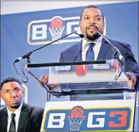  ?? AP PHOTO ?? In this Jan. 11 photo, entertaine­r Ice Cube, right, announces the launch of the Big3 profession­al basketball league as former NBA player and players union deputy Roger Mason looks on in New York.