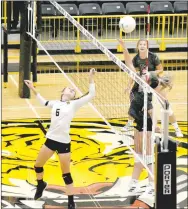  ?? MARK HUMPHREY ENTERPRISE-LEADER ?? Prairie Grove sophomore Reese Powell tries to catch Huntsville off guard by playing the ball over on a second hit. The Lady Tigers lost in four sets (25-16, 21-25, 12-25, 22-25) on Thursday.