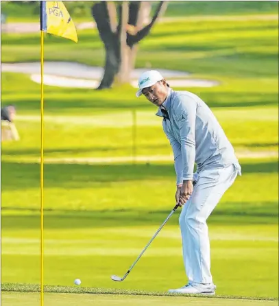  ?? Charlie Riedel The Associated Press ?? China’s Haotong Li had five birdies through 10 holes and eight tough pars down the stretch to lead the PGA Championsh­ip.