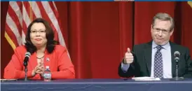  ?? | SETH PERLMAN/ AP ?? Tammy Duckworth ( left) and Mark Kirk debate Thursday night.